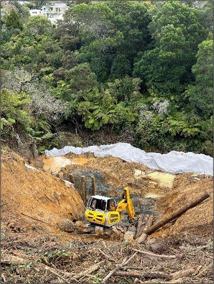 Menzi Muck working the Kia Ora Road slip